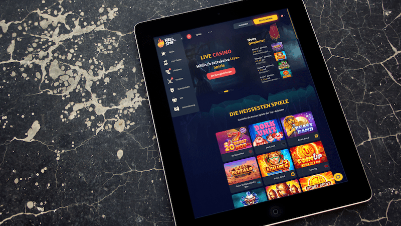 HellSpin Casino auf einem iPad-Bildschirm