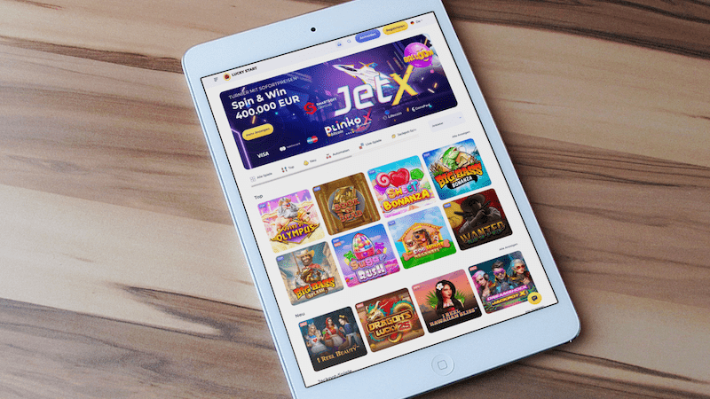 LuckyStart Casino auf einem iPad-Bildschirm